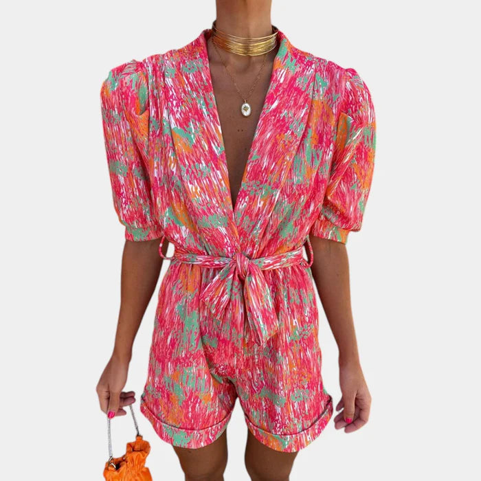 Korte Zomerjumpsuit met Levendige Print en Taille-accentuerende Riem