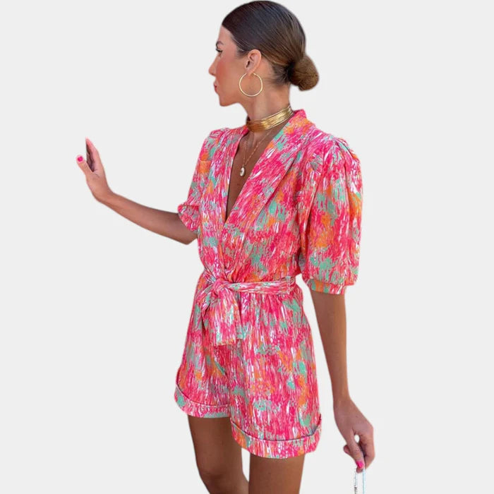 Korte Zomerjumpsuit met Levendige Print en Taille-accentuerende Riem