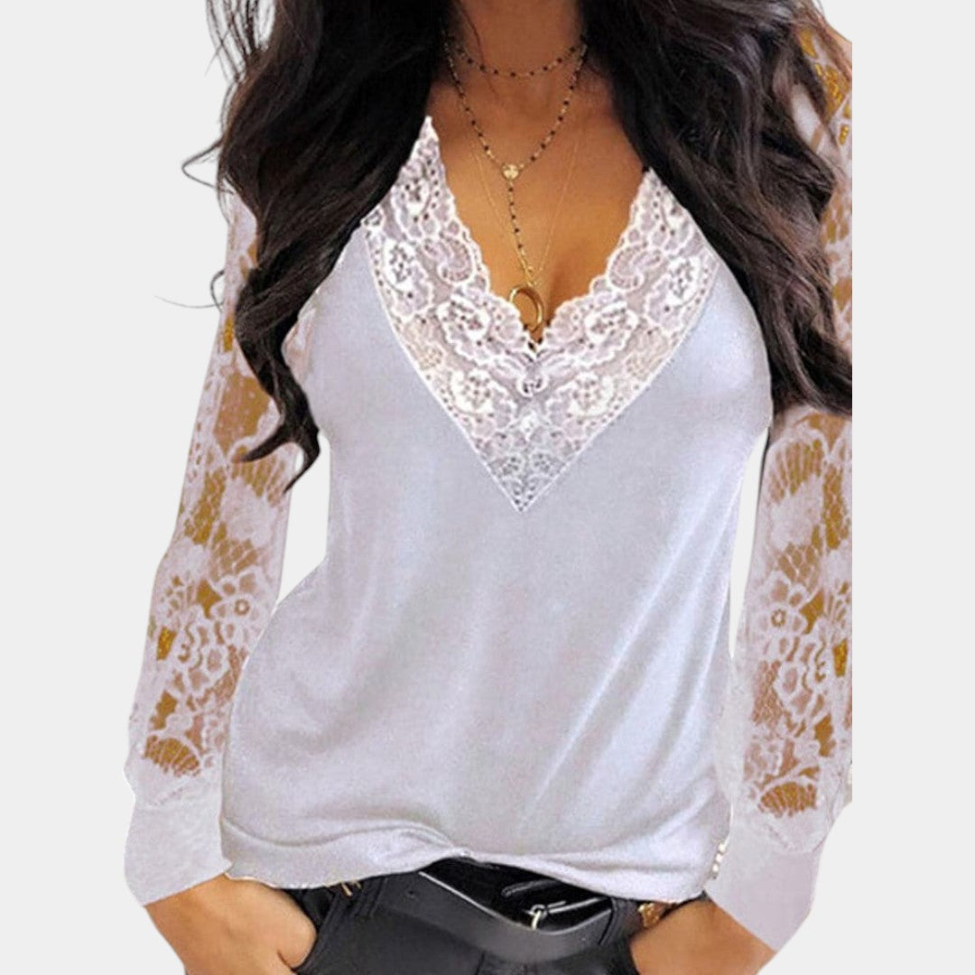 Dames blouse met V-hals en kanten mouwen in een elegante pasvorm, ideaal voor werk, diners of stijlvolle momenten.