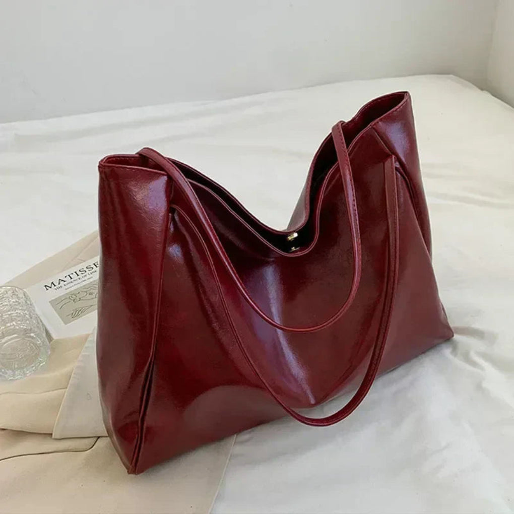 https://cdn.shopify.com/s/files/1/0836/3265/2620/files/0-main-women-tote-bag-fashion-underarm-pouch-large-capacity-soft-pu-leather-shoulder-bag-retro-crossbody-bag-casual-portable-bucketbags.webp?v=1752645254