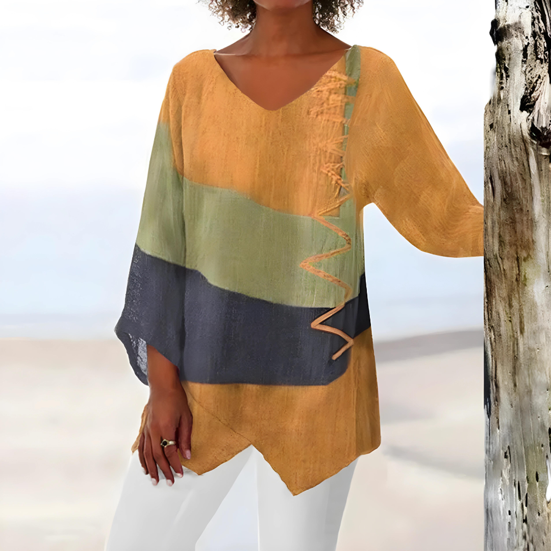 Evelien – Elegante Patchwork Blouse met Asymmetrisch Design