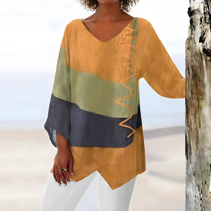 Evelien – Elegante Patchwork Blouse met Asymmetrisch Design