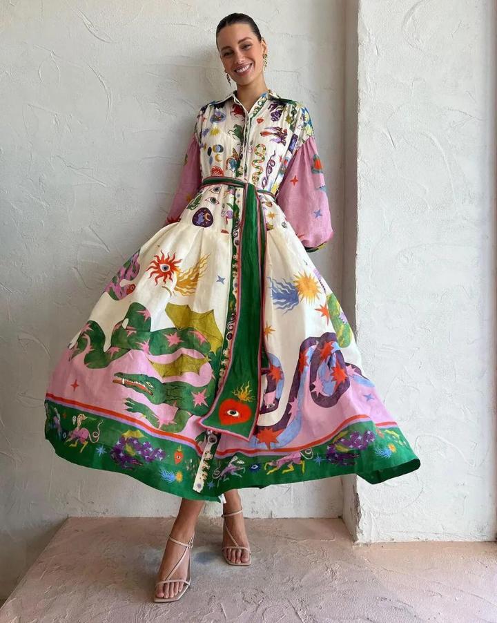 Uitlopende midi-jurk met een all-over grafische print - Lela