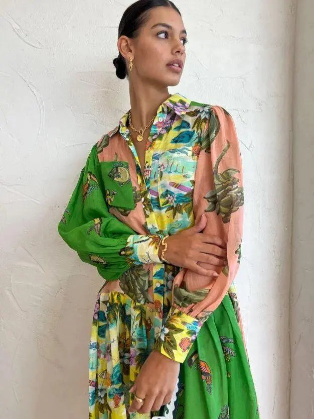 Uitlopende midi-jurk met een all-over grafische print - Lela