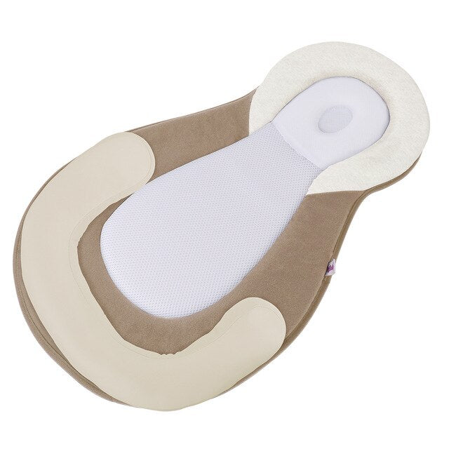 Ergonomisch draagbaar babynestje met hoofdsteun tegen een plat hoofdje – Schlafcocon