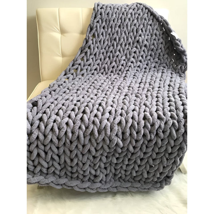 Grof gebreide plaid met zachte chenillegaren en extra grote lussteken imitatiebont