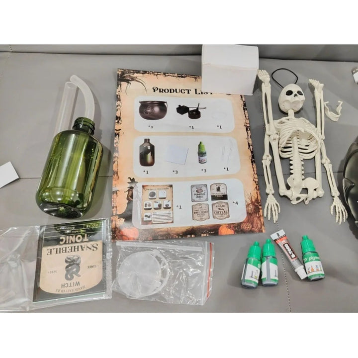 Halloween-heksenketel-decoratie met mistmachine, ledverlichting en zwevend flesje als decorstuk