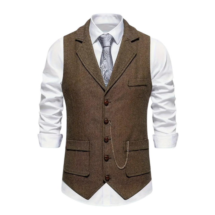 https://cdn.shopify.com/s/files/1/0659/5451/2986/files/heren-vintage-vest-in-visgraat-tweed-klassieke-stijl-met-elegante-revers-perfect-voor-elke-gelegenhe-2.png?v=1753546076