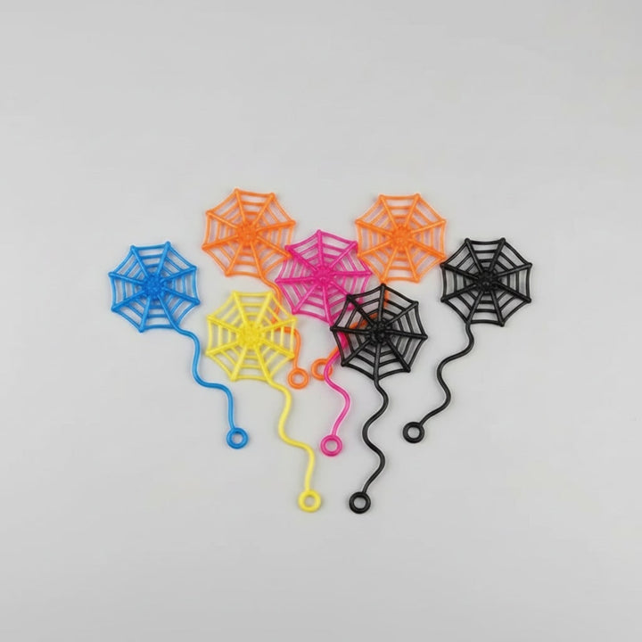 Halloweendecoratie voor kinderen: kleverige spinnenweb-uitdeelcadeautjes, rekbare neon raamstickers met golvende staart