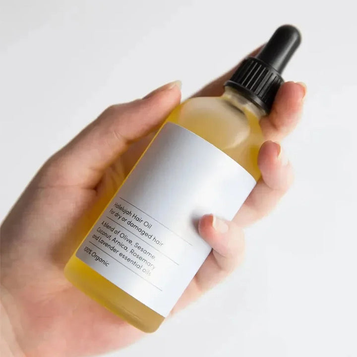 Natuurlijke rozemarijn-haargroeiolie – HerbGlow