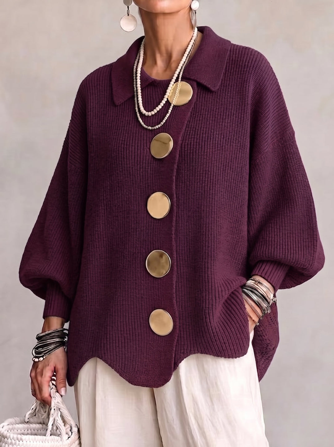 Oversized vest met kraag en grote metalen knopen