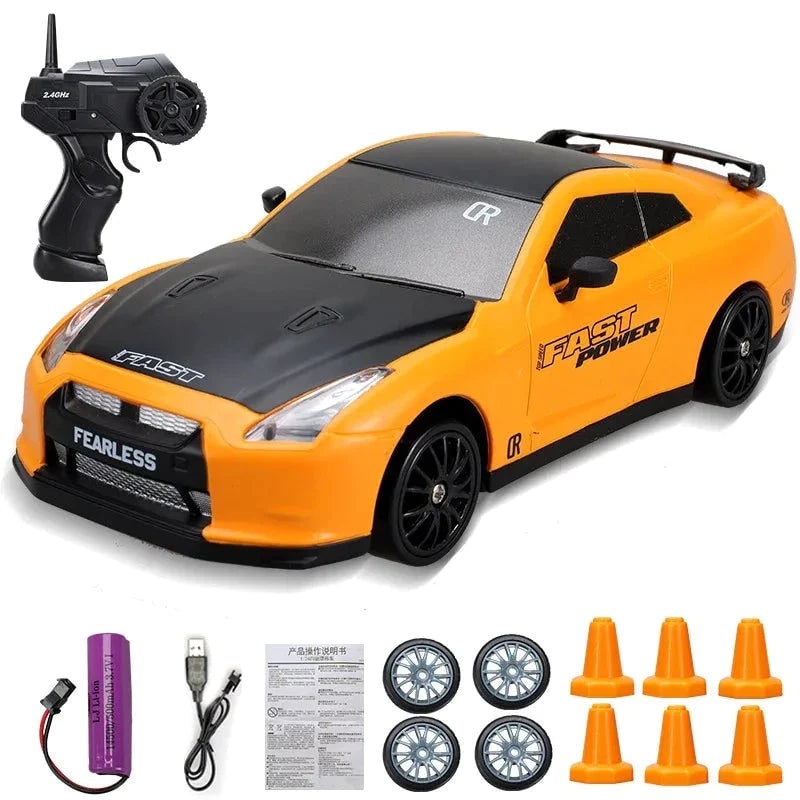 RC driftauto met afstandsbediening, LED-koplampen, reservewielen en verkeerskegels