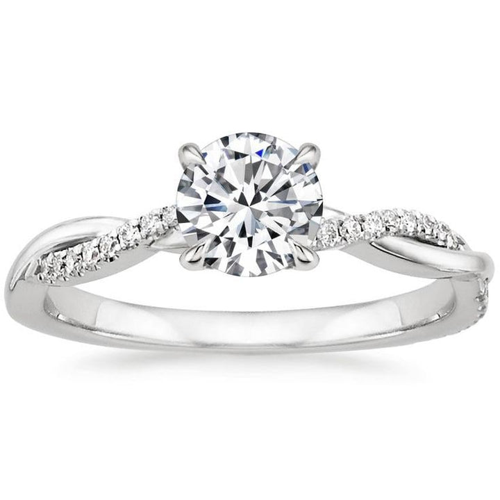 Ronde briljant solitaire verlovingsring met gedraaide band en pavé-accenten met diamantlook