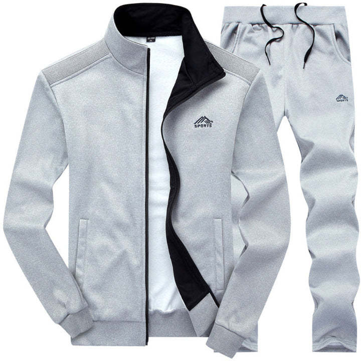 https://cdn.shopify.com/s/files/1/0659/5451/2986/files/stijlvol-gevoerd-heren-trainingspak-voorzijde-met-kraag-en-uitstekende-pasvorm-blauw-donkergrijs-of--1.jpg?v=1753581044