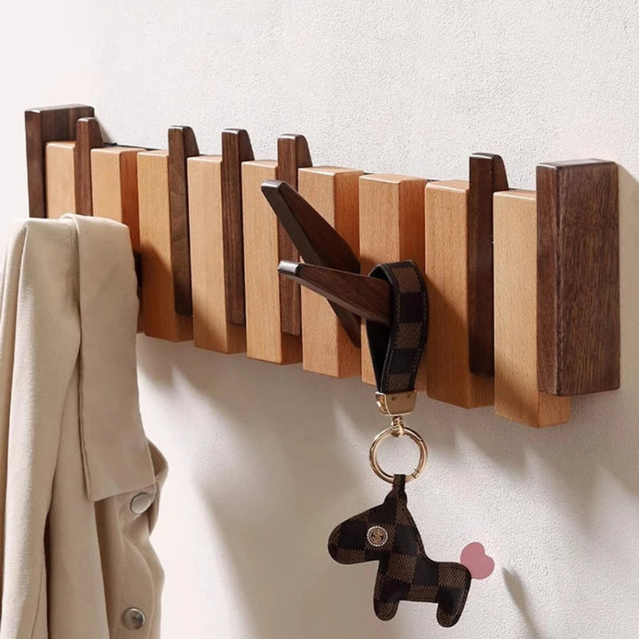 Wandkapstok met houten klaphaken – ruimtebesparende organizer voor de hal