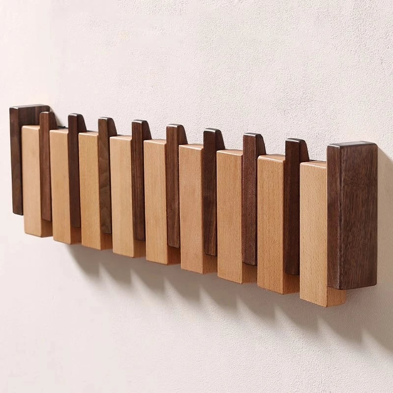 Wandkapstok met houten klaphaken – ruimtebesparende organizer voor de hal