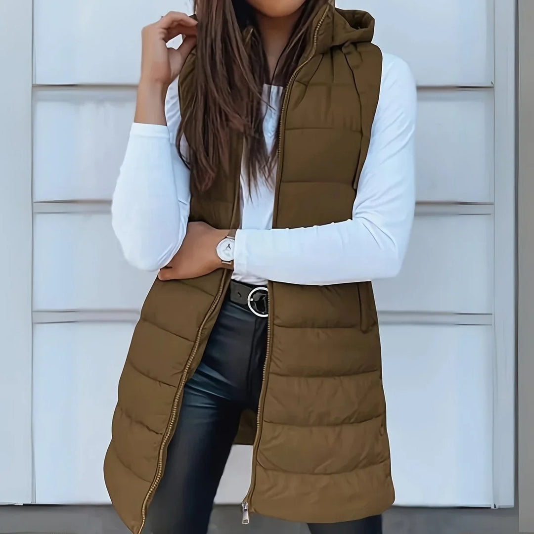Lange mouwloze puffer gilet met capuchon