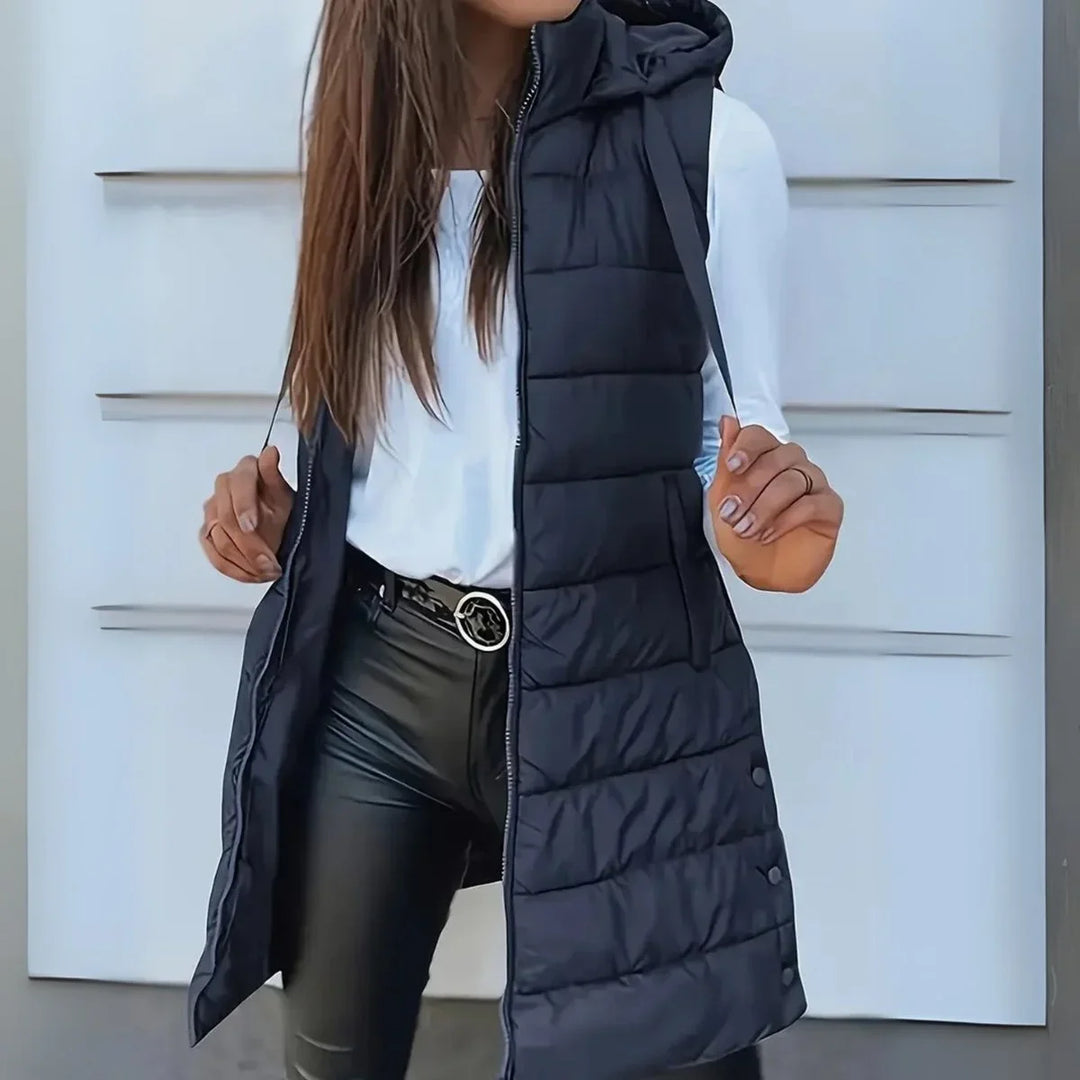 Lange mouwloze puffer gilet met capuchon