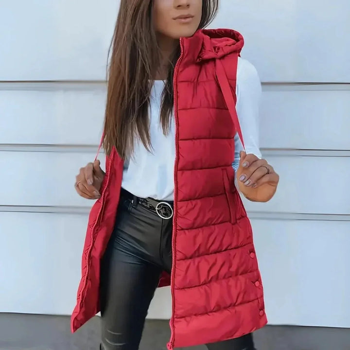Lange mouwloze puffer gilet met capuchon